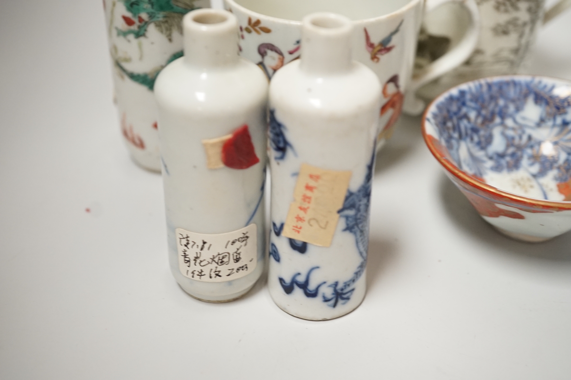 A group of Chinese porcelain snuff bottles and other export Chinese porcelain, an English porcelain cup, etc